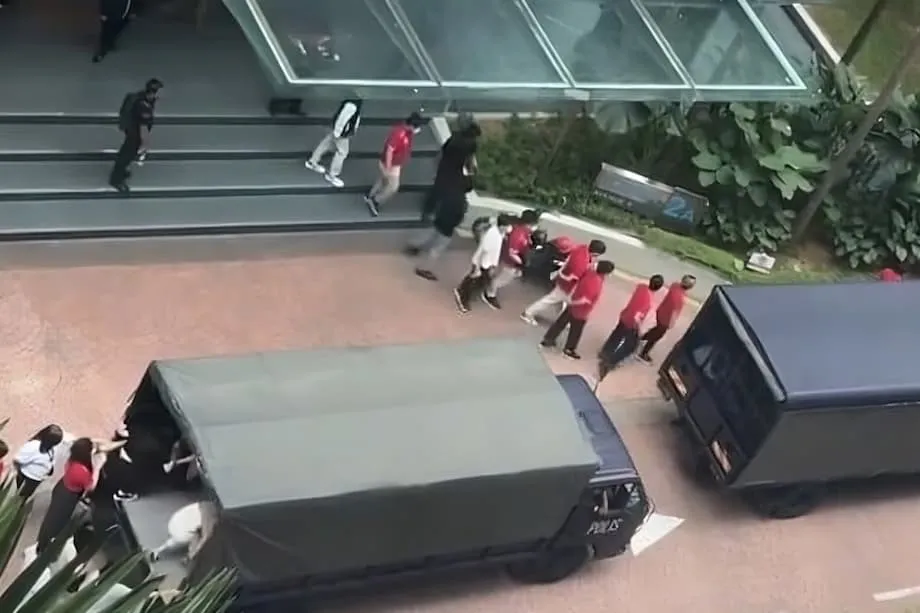 La policía de Malasia detiene a más de 400 personas en una gran redada contra Doo Group, vinculado a Singapur, en medio de una ofensiva contra las estafas